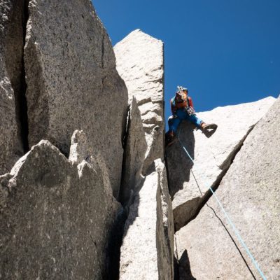 Mihnea cruising through the first crux off the initial ramps on Frendo Spur.